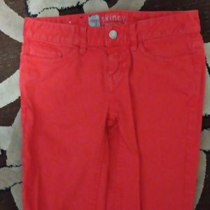 Universal threads jet red skinny jeans.